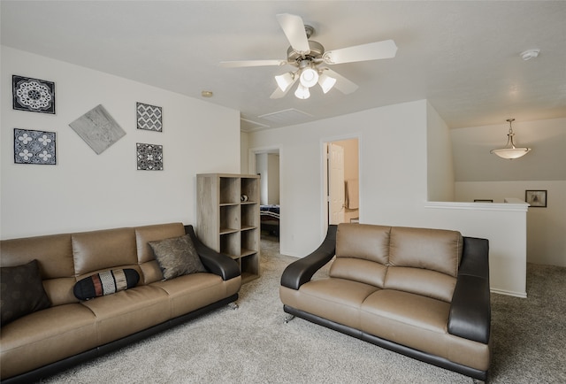 living room with carpet flooring, ceiling fan, and vaulted ceiling