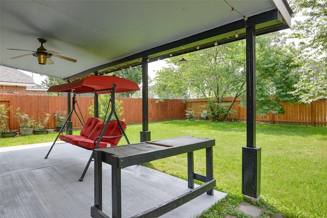 view of patio / terrace with a fenced backyard and ceiling fan