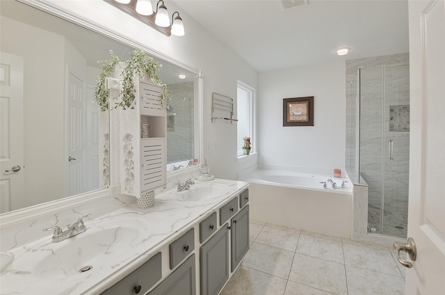 full bath featuring double vanity, a sink, a bath, and a stall shower