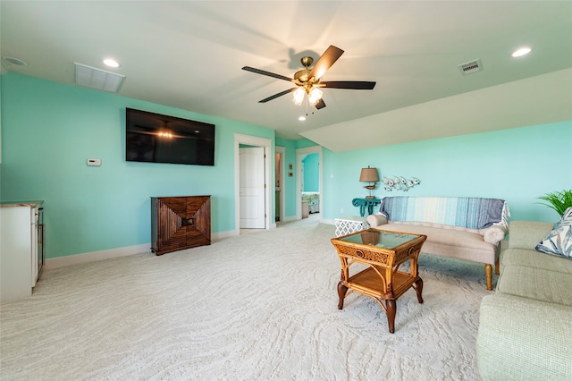 living area with recessed lighting, visible vents, ceiling fan, and baseboards