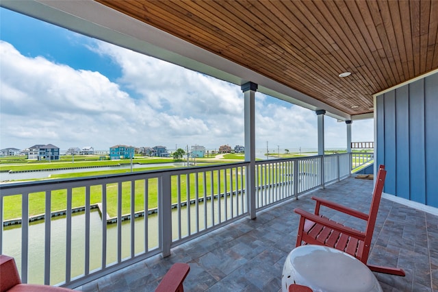 view of patio featuring a water view