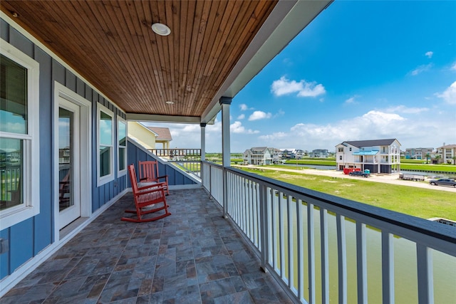 balcony featuring a residential view