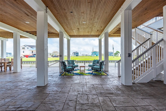 view of patio with a water view