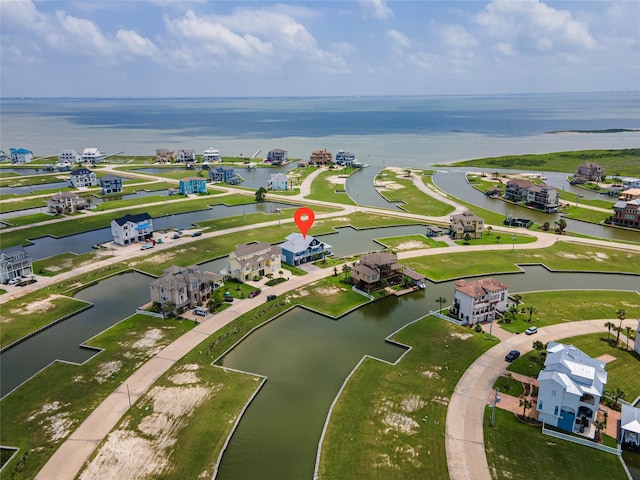 drone / aerial view with a water view