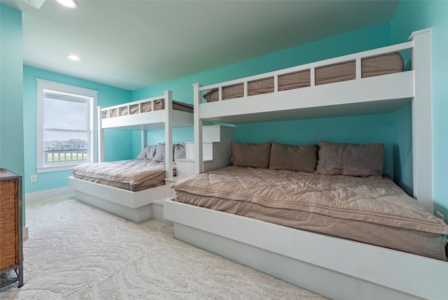 bedroom with carpet floors and recessed lighting