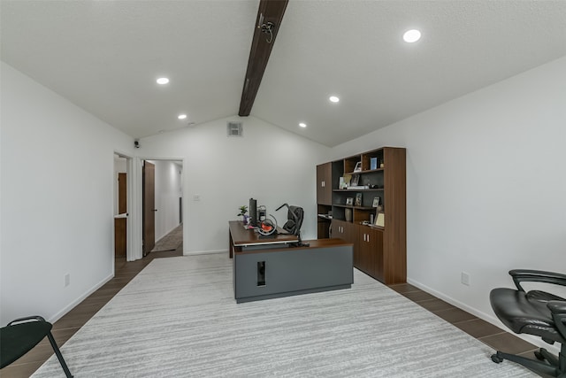 office featuring lofted ceiling with beams and dark wood-type flooring