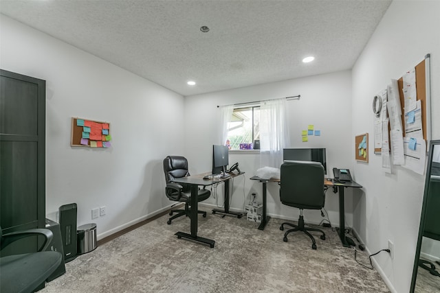 office area featuring a textured ceiling