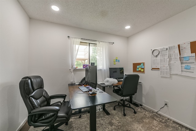 home office with a textured ceiling