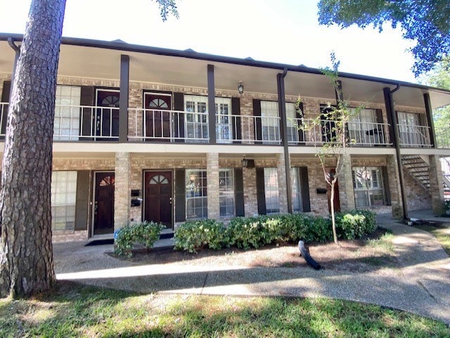 multi unit property featuring brick siding