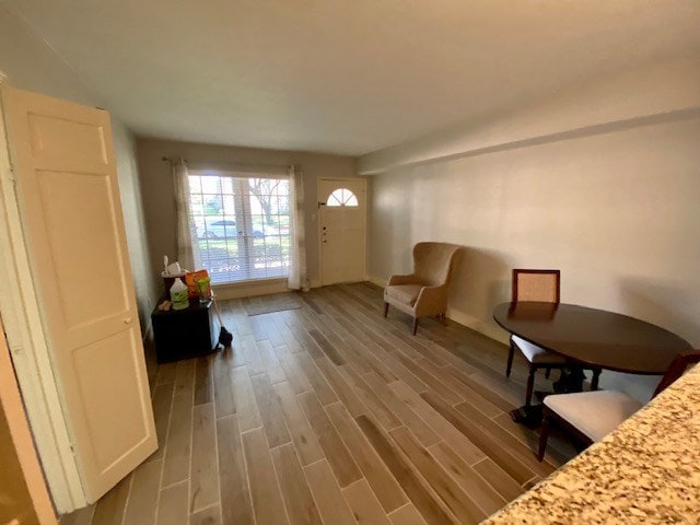 sitting room featuring light hardwood / wood-style flooring