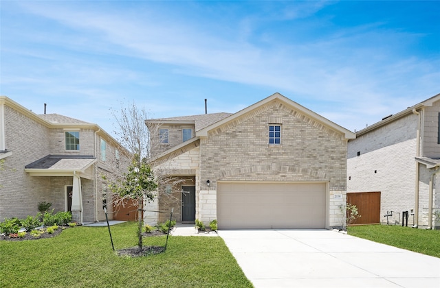 view of front of house featuring a garage and a front yard