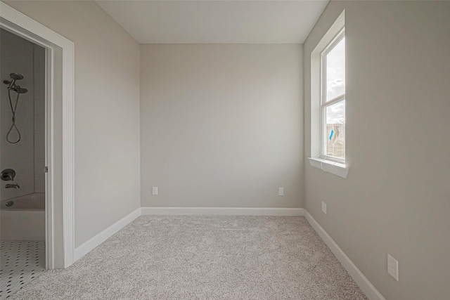 4748 Mallow St, Houston, TX 77033 - spare room featuring baseboards and carpet flooring
