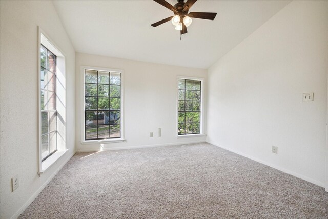 unfurnished room with carpet, ceiling fan, and lofted ceiling