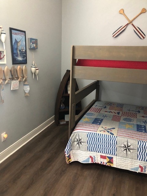 bedroom featuring dark hardwood / wood-style floors