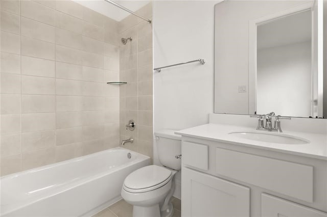 full bathroom with tiled shower / bath, vanity, tile patterned floors, and toilet