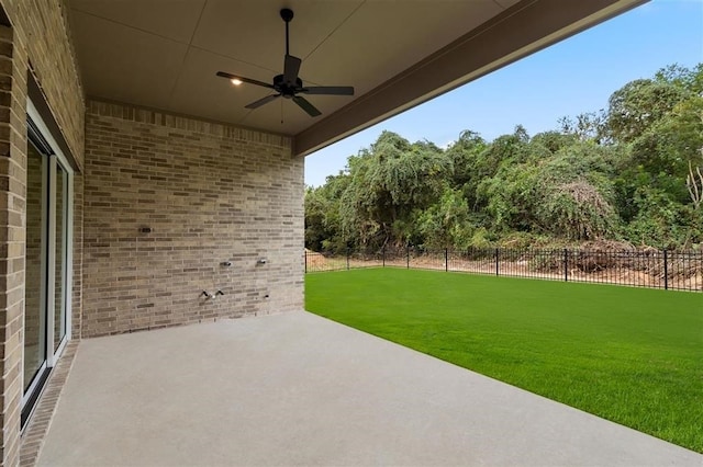 view of patio featuring ceiling fan