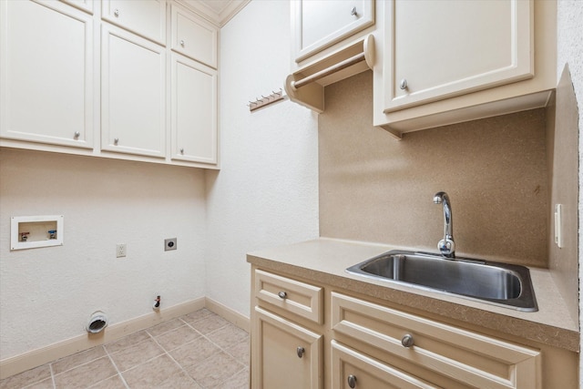 laundry room featuring sink, cabinets, washer hookup, hookup for a gas dryer, and hookup for an electric dryer