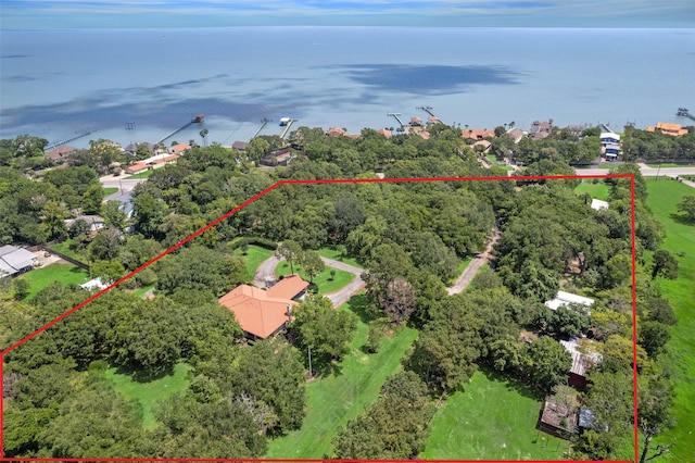 birds eye view of property featuring a water view