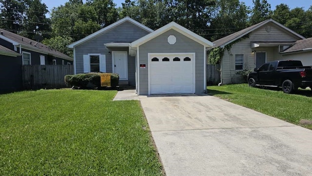 ranch-style house featuring a front lawn and a garage