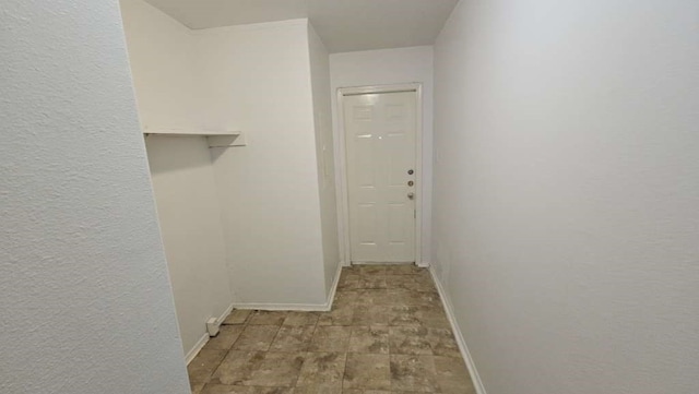 corridor featuring light wood-type flooring