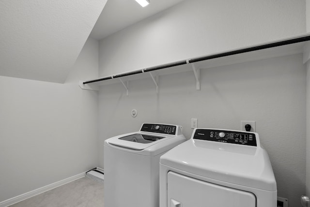 laundry room with independent washer and dryer