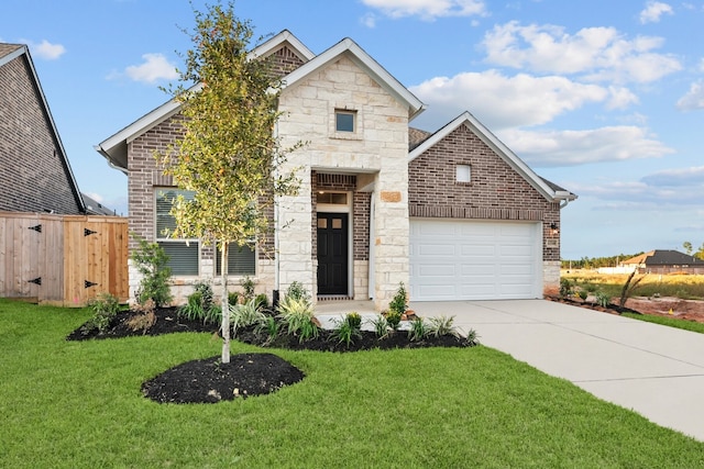 view of front of house featuring a garage and a front lawn