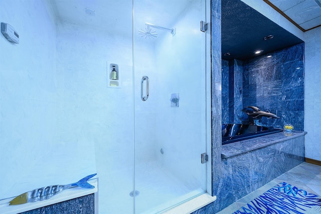 bathroom featuring tile patterned flooring and plus walk in shower