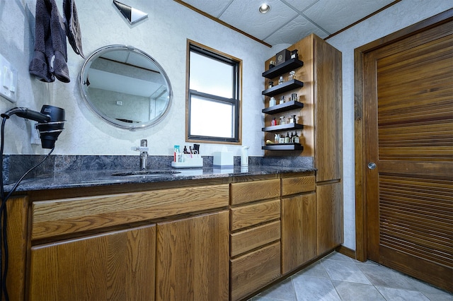 bathroom featuring tile patterned floors and vanity