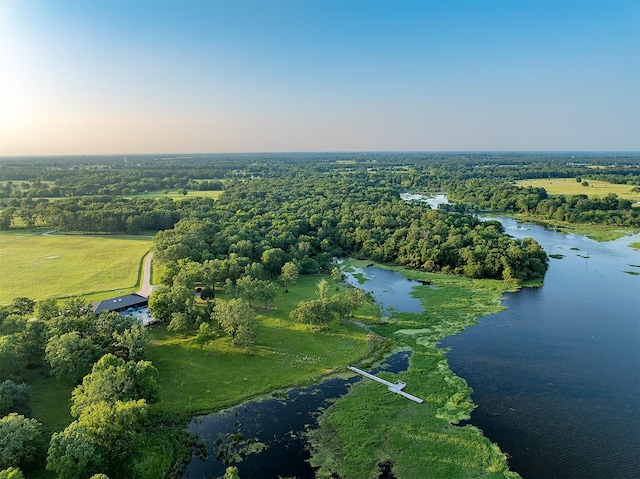 aerial view at dusk with a water view