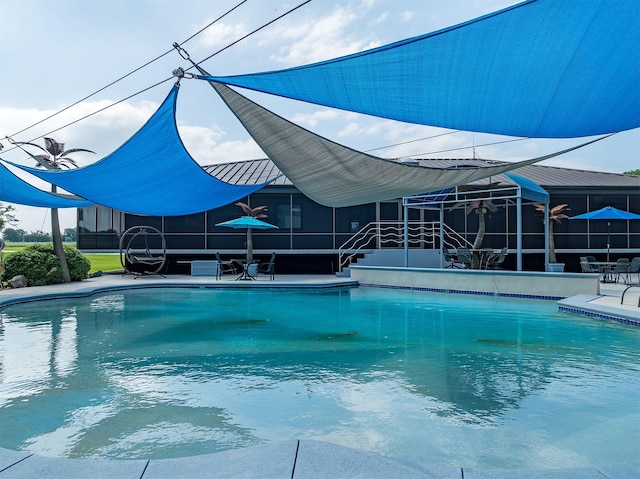 view of pool featuring a patio area