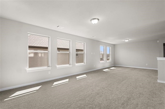 unfurnished room with carpet