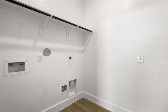 laundry area featuring hookup for a washing machine, hookup for a gas dryer, dark hardwood / wood-style flooring, and electric dryer hookup