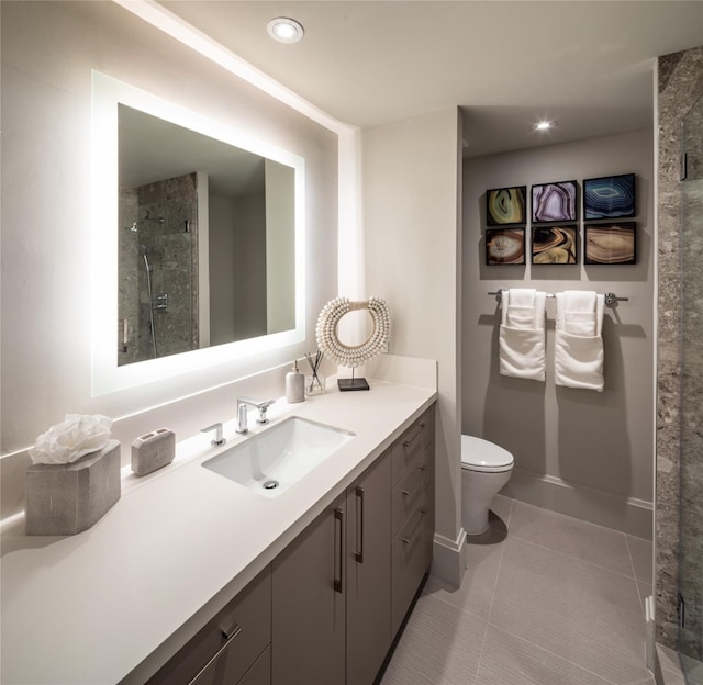 bathroom with a shower with door, tile patterned floors, vanity, and toilet