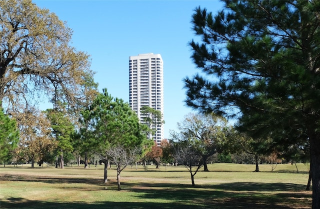 surrounding community featuring a yard