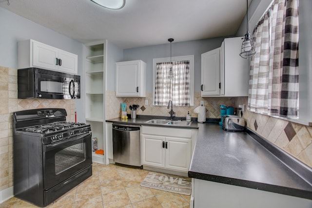 kitchen with black appliances, pendant lighting, white cabinets, and sink