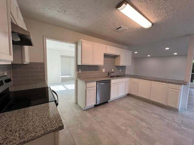 kitchen featuring range hood, white cabinetry, stainless steel dishwasher, sink, and tasteful backsplash