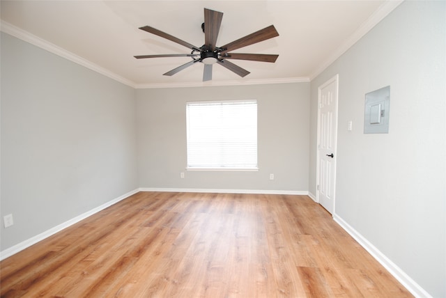 empty room featuring ceiling fan, light hardwood / wood-style flooring, and crown molding