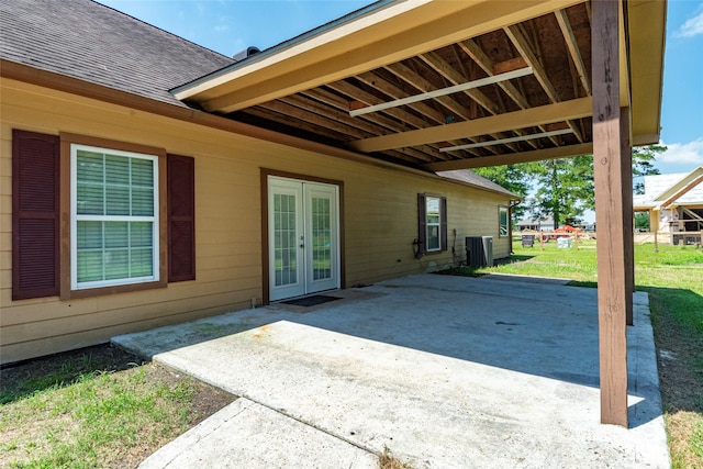 view of patio with french doors and cooling unit