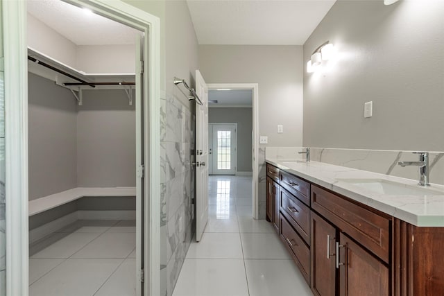 bathroom with vanity and tile patterned floors