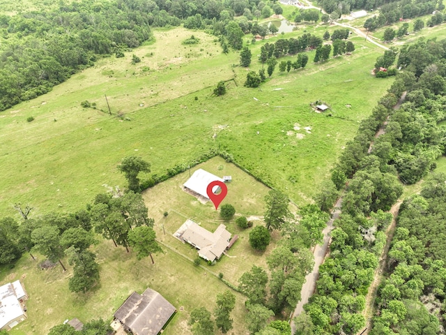 birds eye view of property featuring a rural view