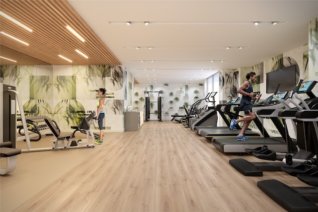 gym with hardwood / wood-style flooring