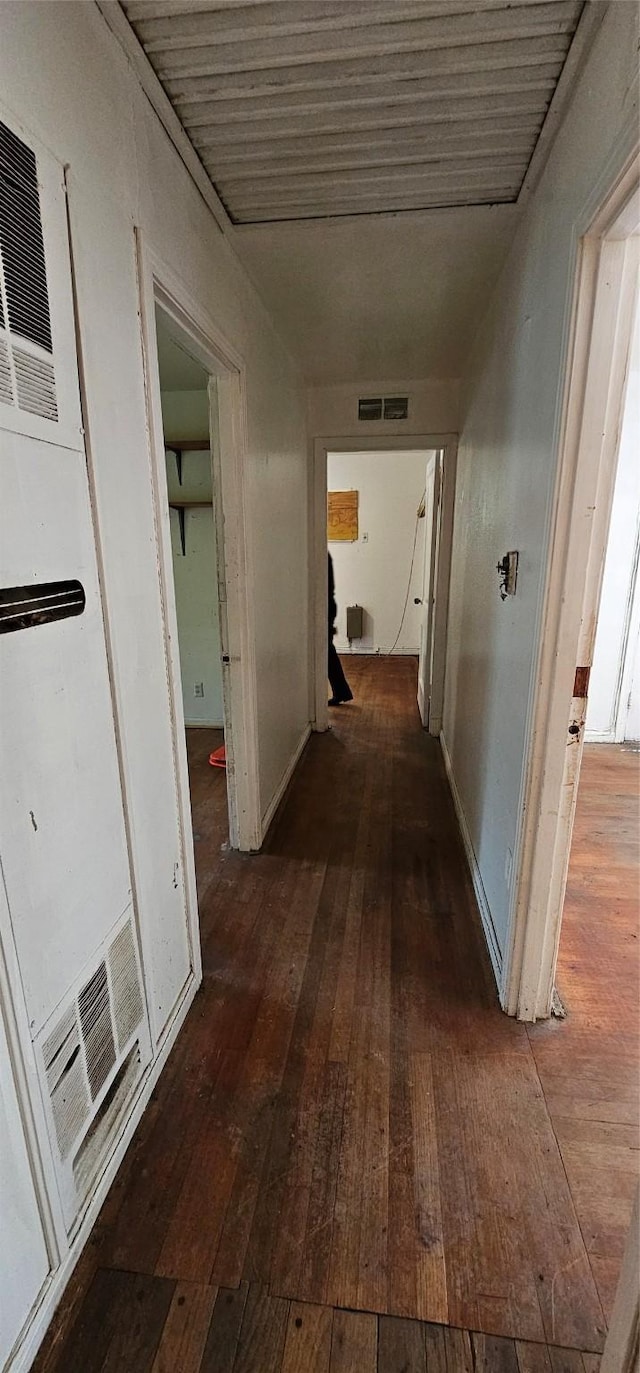 hallway featuring dark hardwood / wood-style floors