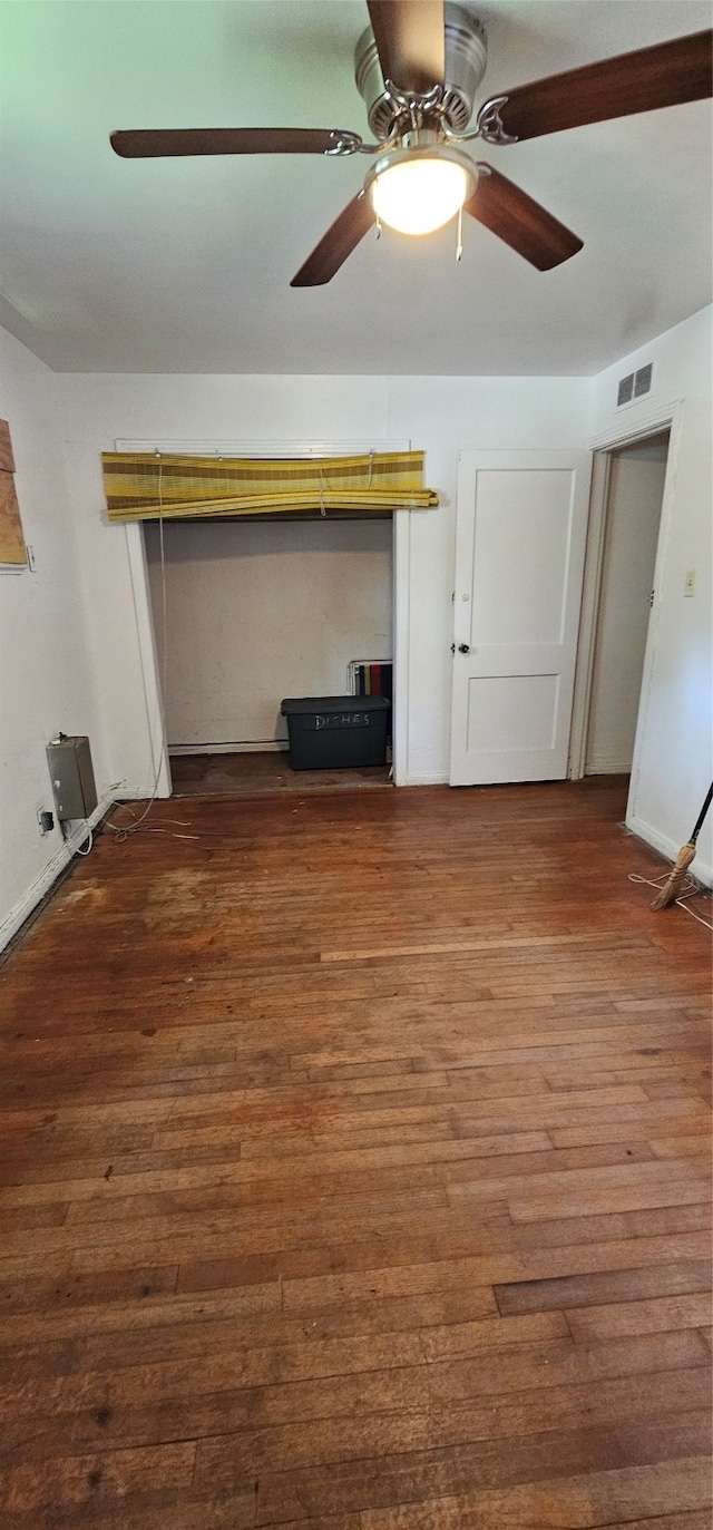 interior space featuring dark hardwood / wood-style floors and ceiling fan