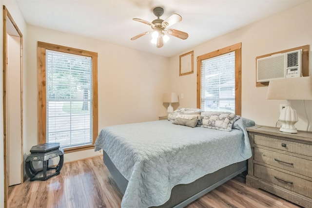 bedroom featuring light hardwood / wood-style floors and ceiling fan