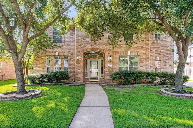 view of front of house with a front yard