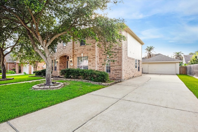 view of front facade with a garage and a front lawn