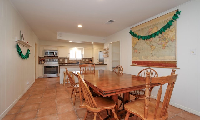 dining area featuring built in shelves