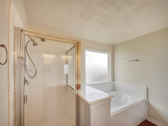 bathroom featuring plus walk in shower