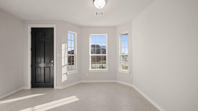 view of tiled entrance foyer