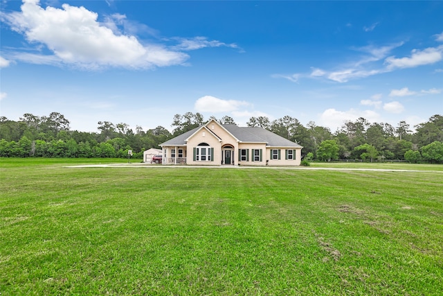 view of front of property with a front lawn